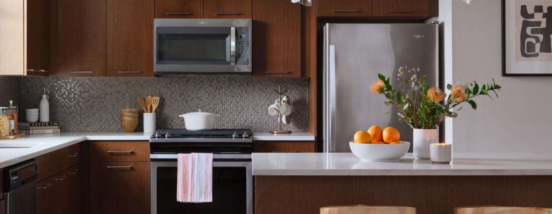 a kitchen with a stove and oven