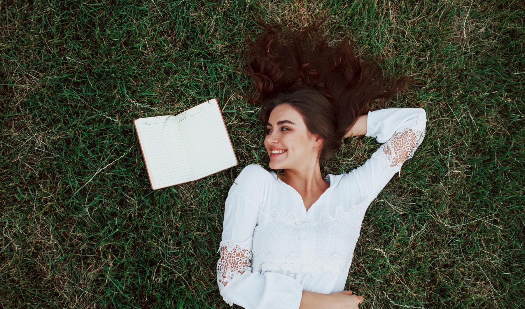 a person lying in the grass