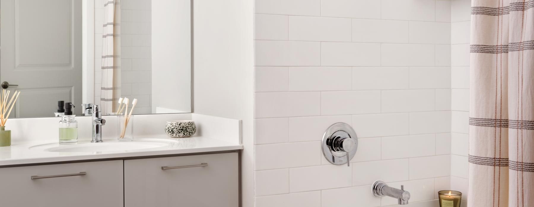 a bathroom with a tub and sink