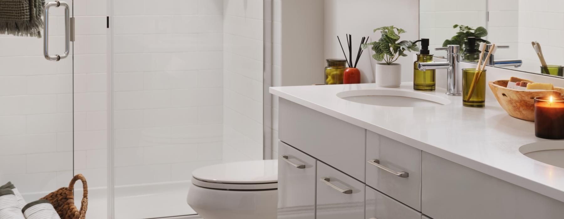 a bathroom with a shower unit and toilet