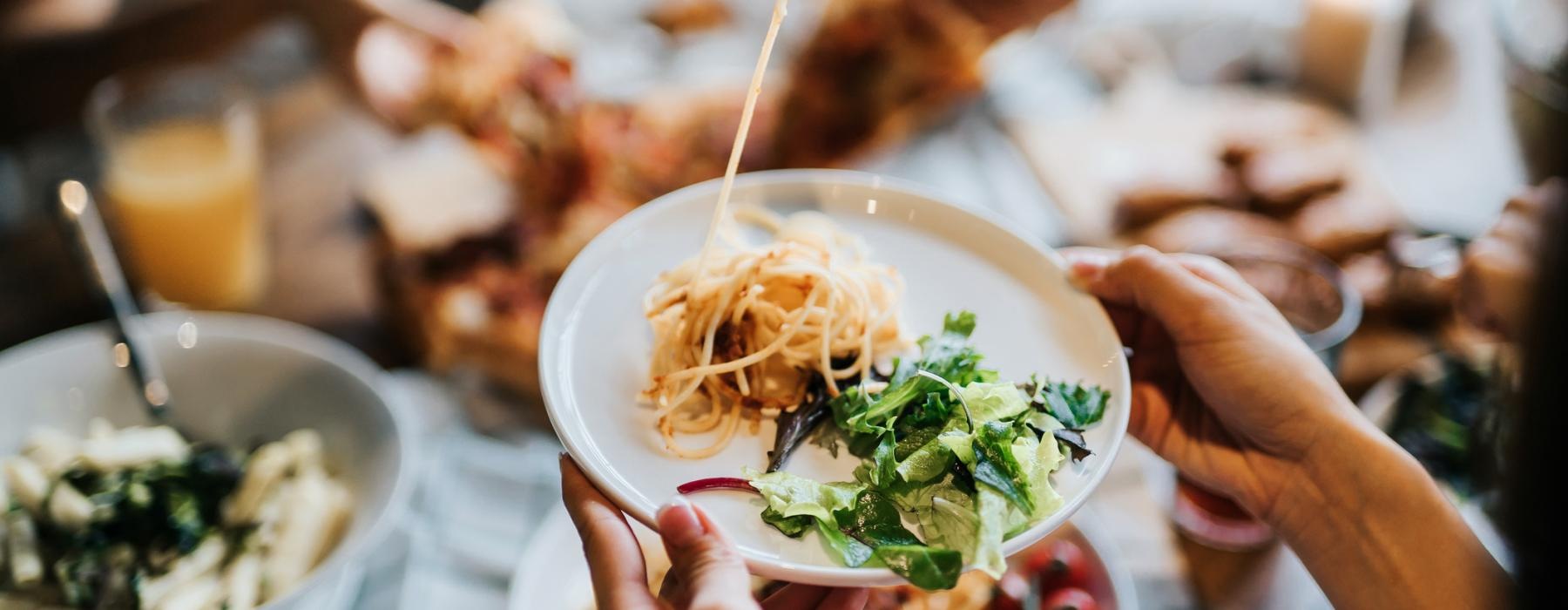 a group of people eating at a table