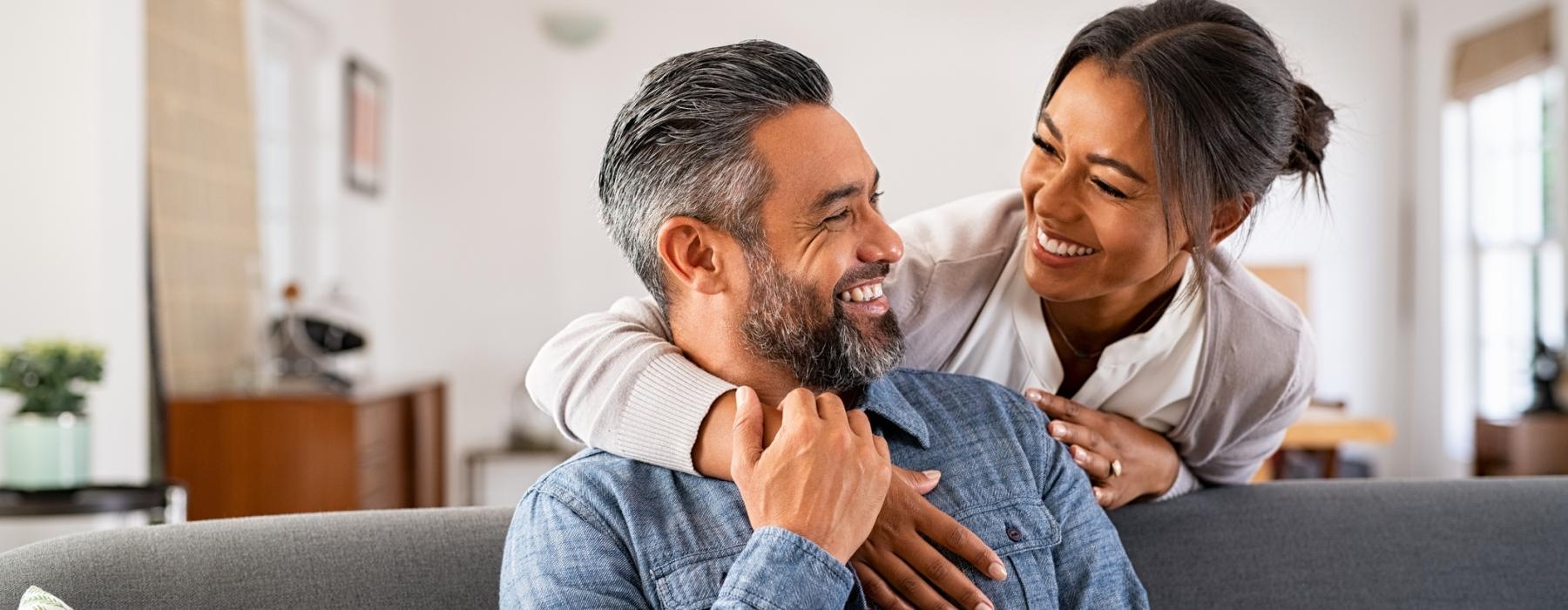 a man and a woman sitting on a couch